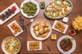 Recipes of typical Spanish dishes and tapas with croquettes of various flavors, salad with tuna and tomato, fried padron peppers,