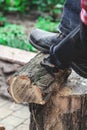 Reciprocating power saw sawing round timber closeup Royalty Free Stock Photo