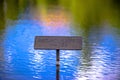 Recirculated water sign on reflective pond Royalty Free Stock Photo