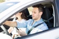 Reckless man driving car and using phone Royalty Free Stock Photo