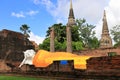 The Reclining Buddha in antique ruins building and Ancient antiquity architecture of old capital of thailand