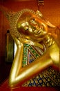 Reclining buddha in a buddhist temple.