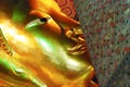 Reclining Buddha gold statue face