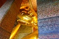 Reclining Buddha gold statue face Royalty Free Stock Photo