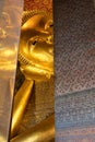 Reclining Buddha gold statue face. Wat Pho