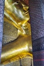 Reclining Buddha gold statue face in Wat Pho, Bangkok, Thailand Royalty Free Stock Photo