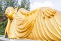 Reclining Buddha gold statue at Phuket, Thailand Royalty Free Stock Photo