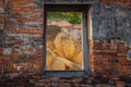 Reclining Buddha in a Ruin of a Hall at Phutthaisawan Temple in Ayutthaya Historical Park, Thailand