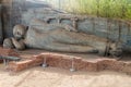 Reclining Buddha statue at Gal Vihara rock temple in the ancient city Polonnaruwa, Sri Lan Royalty Free Stock Photo