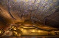 A reclining Buddha statue located in Cave Three at Dambulla Cave Temples.