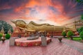 A reclining Buddha statue at Wat Pha That Luang lacated in Vientiane, Laos Royalty Free Stock Photo