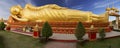 Reclining Gold Covered Buddha Statue Pha That Luang Vientiane Laos Panoramic