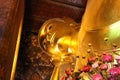 Reclining golden buddha statue