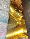 Reclining golden buddha, Wat Phra Chetuphon Watpho, Bangkok, Thailand Royalty Free Stock Photo