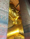 Reclining golden buddha, Wat Phra Chetuphon Watpho, Bangkok, Thailand Royalty Free Stock Photo