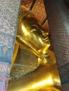 Reclining golden buddha, Wat Phra Chetuphon Watpho, Bangkok, Thailand Royalty Free Stock Photo