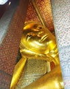 Reclining golden buddha, Wat Phra Chetuphon Watpho, Bangkok, Thailand Royalty Free Stock Photo