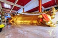 Reclining golen Buddha statue in Wat Koh Sirey