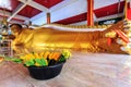 Reclining golen Buddha statue in Wat Koh Sirey