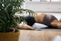 Reclining hero pose Supta Virasana, iyengar yoga asana woman closeup Royalty Free Stock Photo