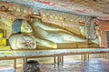 Reclining Lord Buddha in Maharaja Cave of Dambulla