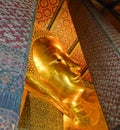 A reclining statue of Buddha in the Ubosot of Phra Chetuphon Vamolmangklararam Temple.