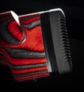 Recoil pad on a rifle with a red and black laminated stock Royalty Free Stock Photo