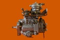 Reconditioned diesel car high pressure pump on a white background. Automotive diesel pump, mechanical, from older type car. View