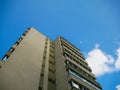 Reconditioned old apartment building against blue sk Royalty Free Stock Photo