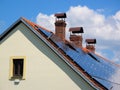 Reconstructed house with solar panels