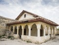 Reconstructed Karaim kenasa in medieval cave town Chufut-Kale. Royalty Free Stock Photo