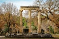 Reconstructed pillars of temple at ancient Olympia Greece on rounded foundation in wintertime