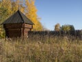Reconstructed wooden watchtower of the 17th century and a palisade made of sharpened logs in the Siberian village of Umreva in