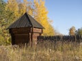 Reconstructed wooden watchtower of the 17th century and a palisade made of sharpened logs in the Siberian village of Umreva in