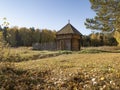 Reconstructed wooden watchtower of the 17th century and a palisade made of sharpened logs in the Siberian village of Umreva in