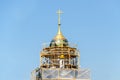 Reconstruction of the golden domes of Orthodox chapel. Repair of the church against the blue sky Royalty Free Stock Photo