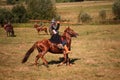 Reconstruction. Medieval armored knight with lance on horse from fantasy. Equestrian soldier in historical costume