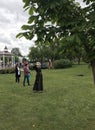 Reconstruction of medieval games: soldiers in armor and cold steel. The ladies are shooting from the bow.