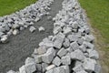 Reconstruction of a pack sidewalk with cobbles