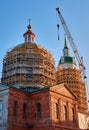 Reconstruction of the orthodox cathedral at golden hour under the sunlight