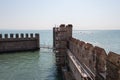 Reconstruction of Scaliger Castle fortification walls with horizon line on background, Sirmione, Lombardy, Italy Royalty Free Stock Photo