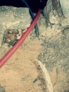 Reconstruction site with trench. Wires in and protective pipe Royalty Free Stock Photo