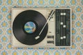 Record player on top of flower wallpaper Royalty Free Stock Photo