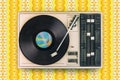 Record player on top of flower wallpaper Royalty Free Stock Photo