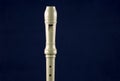 Recorder Instrument Isolated Against a Blue Background Royalty Free Stock Photo