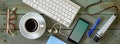 Recording podcast or audiobook concept, flat lay with smartphone, vintage microphone, coffee and keyboard on wooden table, Royalty Free Stock Photo