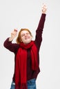 Cropped vertical portrait of young Caucasian girl recovering from a cold isolated over white background. Normal body