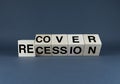 Recovery or recession. The cubes form the words Recover or Recession