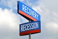 Recovery and recession - street sign, sky in background Royalty Free Stock Photo