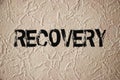 Recovery sign on grunge wall. Addictions or crisis rehabiliation concept Royalty Free Stock Photo